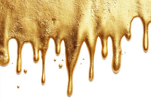 Golden liquid dripping in glossy patterns on a white surface photo