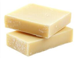 Natural handmade soap bars stacked on a white background photo