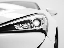 Close-up view of a sleek white car headlight design photo