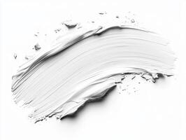 White paint stroke on a clean surface showcasing texture and depth photo