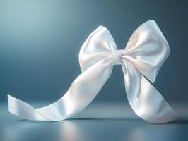 Elegant white satin bow on a soft blue background photo