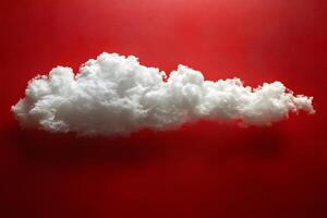 Surreal Cloud Formation Against Bold Red Background for Modern Design Concepts photo