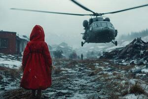 Child in Red Coat Observing Helicopter Landing in Snowy Rural Landscape photo