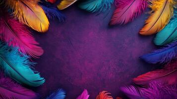Colorful feathers on a purple background photo