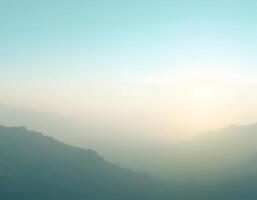 Beautiful fog and sunrise on the mountain background. Natural background. photo