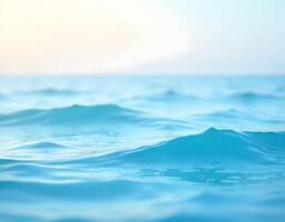 Blue sea water surface close-up. Abstract background for design. photo
