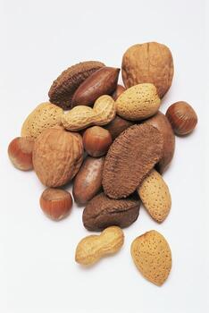 A pile of nuts and nuts on a white background photo