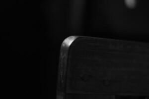 A black and white photo of a black and white chair