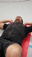 Athlete Exercises With Abs Sit Ups Lying On The Ground video