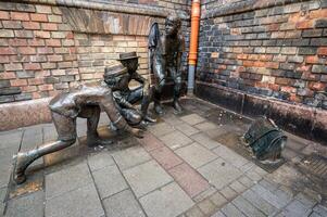 Budapest, Hungary, August 29, 2022. Street view with the representation with metal statues of a moment of play of the boys of Pal street, a famous book photo