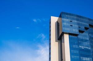 Part of the facade of a modern futuristic building photo