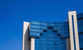 a fragment of the facade of a modern futuristic building photo