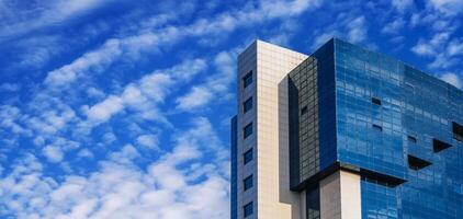 a fragment of the facade of a modern futuristic building photo