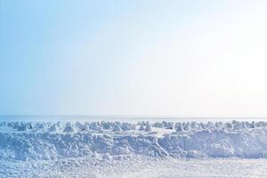 Igloo holiday. Eskimo dwelling made of ice and snow. Lots of igloo built. Panorama view photo