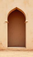 An arched window in a desert building photo
