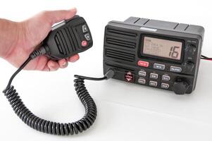 Handheld PTT speaker for trunk radio communication in action during a roadside stop photo
