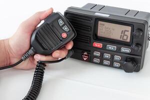 Trunk radio hand handle with speaker and display showing communication information photo