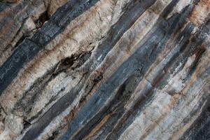 Stone wall display showcasing intricate patterns and textures in natural formation photo