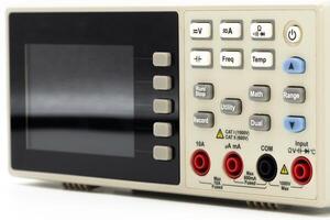 Digital multimeter displaying multiple measurement options for electronics testing and diagnostics photo