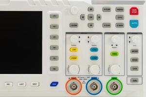 Closeup Modern digital storage oscilloscope showcasing input channels and control features photo