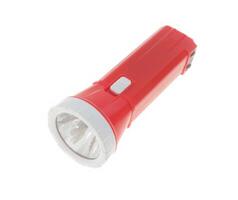 Plastic LED flashlight in red color. Portable flashlight isolate on a white background. photo
