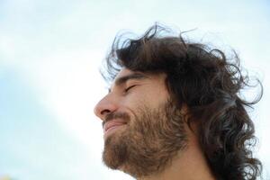 Sad Man In His Life Looks Into The Void And Makes A Slight Smile photo