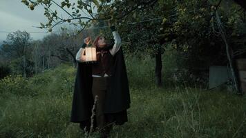 Mysterious Woman Collects Fruits to Perform Esoteric Ritual in the Countryside photo