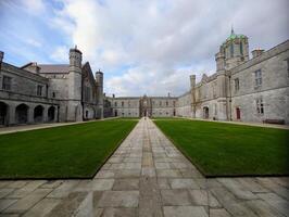 The University of Galway, quadrangle in Ireland, historical architecture and landmarks background photo