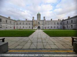 Beautiful University of Galway, quadrangle in Ireland, historical architecture and landmarks background photo