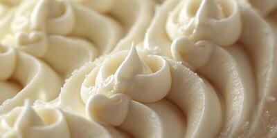 Close up of white frosting on a cake photo