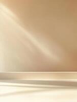 Soft sunlight casts gentle shadows on a minimalist beige wall and floor. photo