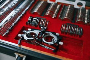 Close up view of optometrist tools and glasses to check the vision photo