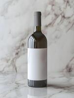 A white wine bottle with a blank label on it photo