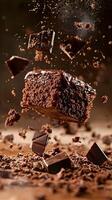 A piece of chocolate cake is being thrown into the air photo