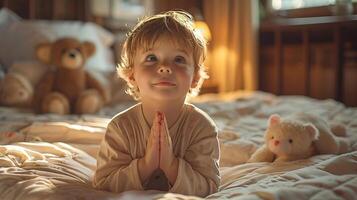 A child prays in a serene and beautifully lit bedroom photo