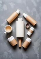 Flat lay composition with cosmetic products on grey background, top view. EcoFriendly Beauty Products photo