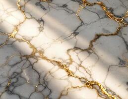 a marble floor with gold and white lines. Gold Veined Marble photo