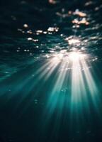 underwater light beams shining through the water. Sunbeams Underwater photo