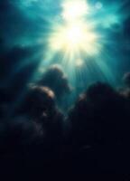Clouds in the blue sky with sun rays and lens flare. Oceanic Sunlight photo