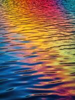 rainbow reflection on water. Rainbow Water Reflection photo