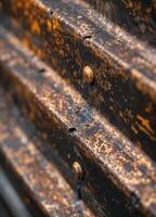 Close up of an old wooden door with rusty iron door handle. Rusty Corrugated Metal Texture photo