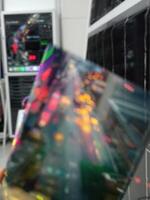 Blurred background of server room in datacenter, shallow depth of field. Abstract City Lights photo