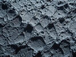 Texture of the surface of the stone. Abstract background for design. Moon Surface Texture photo