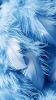 A close-up of soft blue feathers and fluffy textures, creating a serene and calming visual. photo