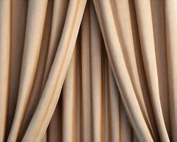 A set of elegant, flowing curtains in a soft beige hue, creating a luxurious ambiance. photo