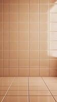 A simple tiled bathroom wall and floor in warm tones, creating a clean and inviting space. photo