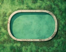 A Tranquil Aerial View of a Serene Swimming Pool Surrounded by Lush Green Grass photo