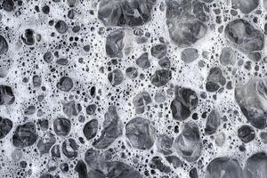 Soap Bubbles and Submerged Objects in Water photo
