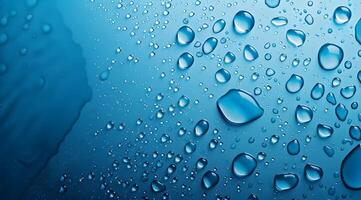 Close-up of Raindrops on a Smooth Surface with Light Blue Background photo