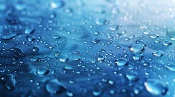 Captivating Close-Up of Water Droplets on a Surface Captured in Beautiful Blue Tones photo